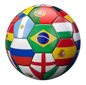 World Cup Football represented by a soccer ball textured by international football teams flags.
